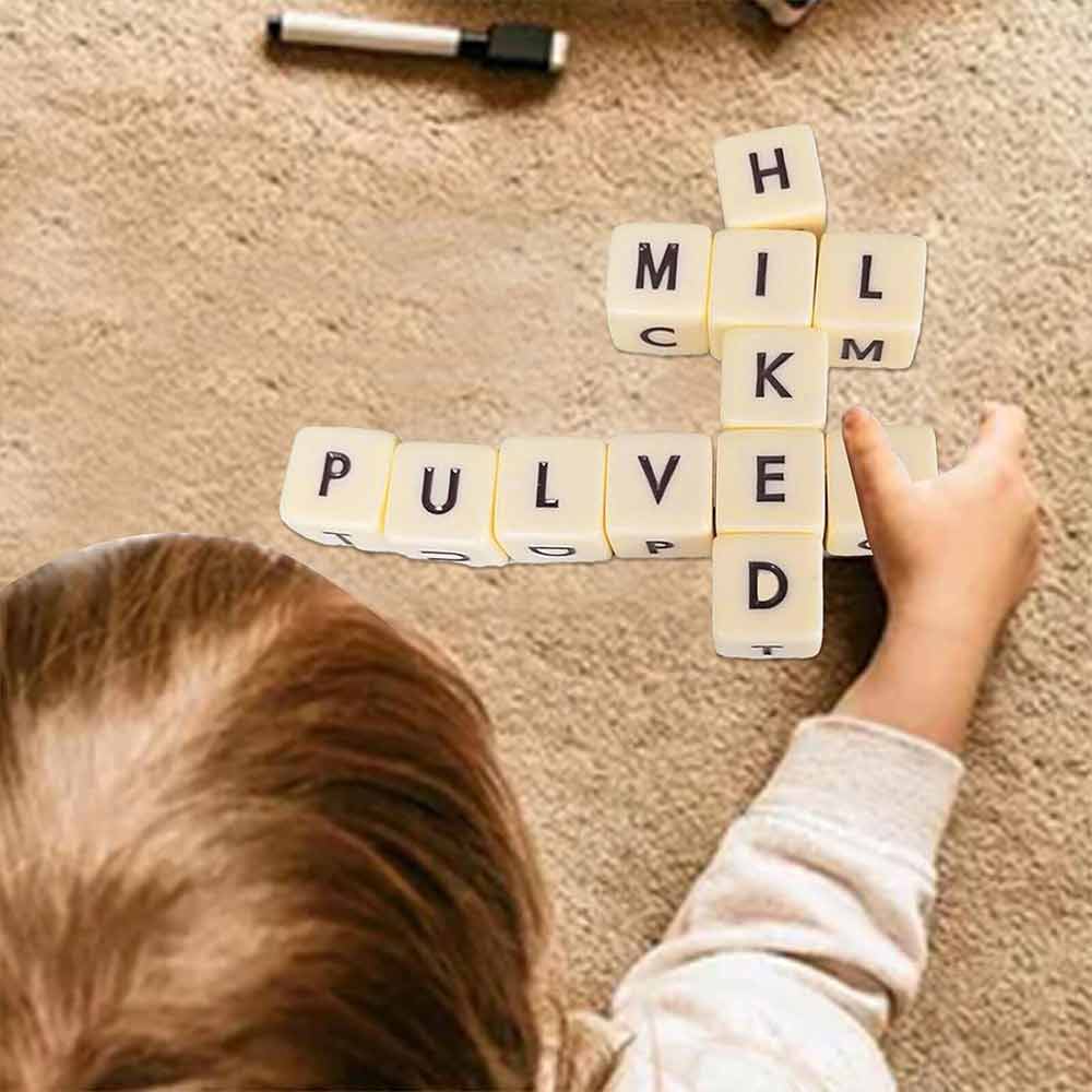 New Q-less Dice Game with Twelve Dice Letters, The Crossword Solitaire Game